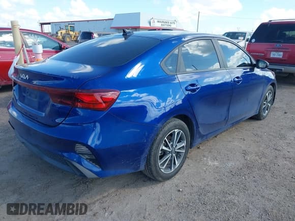 ✅ 2023 Kia Forte LXS • VIN: 3KPF24AD8PE683578 • Lot: 43293302. Listed on IAAI with 14,532 mi. Free auction sales archive from the USA and detailed vehicle history report at DreamBid. Image 4.