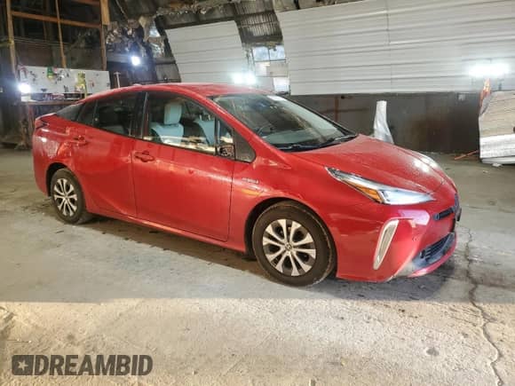 2022 Toyota Prius LE с VIN JTDL9MFUXN3031444, выставлен на аукционе Copart как лот 87211785 с пробегом 102 510 миль миль и Списание • Salvage title. История ставок и продаж доступна на DreamBid. Изображение 4.