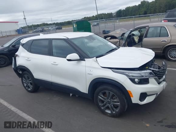 ✅ 2023 Kia Seltos LX • VIN: KNDEPCAA7P7435173 • Lot: 43433136. Listed on IAAI with 32,269 mi. Free auction sales archive from the USA and detailed vehicle history report at DreamBid. Image 13.