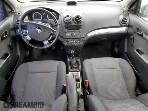 ✅ 2009 Chevrolet Aveo 1LT • VIN: KL1TD56E69B379709 • Lot: 57611735. Wystawiony na Copart z przebiegiem 139 457 mil. Bezpłatny archiwum sprzedaży aukcyjnych z USA i szczegółowy raport historii pojazdu na DreamBid. Zdjęcie 8.