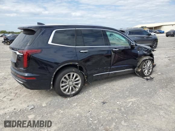 ✅ 2021 Cadillac XT6 Premium Luxury • VIN: 1GYKPFRS9MZ158439 • Лот: 71682945. Опубликован ранее на Copart с пробегом 51 482 миль. Бесплатный доступ к архиву аукционных продаж из США и подробный отчёт об истории автомобиля на DreamBid. Изображение 3.