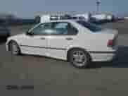 1998 BMW 3 Series 328i with VIN WBACD4324WAV61646, listed as a Copart auction lot 43607845 with 253,609 mi miles and Salvage title. Bid and sale history available at DreamBid. Image 2.