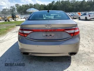 ✅ 2012 Hyundai Azera • VIN: KMHFH4JG1CA166964 • Лот: 71213125. Опубликован ранее на Copart с пробегом 181 191 миль. Бесплатный доступ к архиву аукционных продаж из США и подробный отчёт об истории автомобиля на DreamBid. Изображение 6.