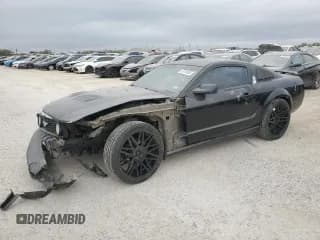 ✅ 2009 Ford Mustang • VIN: 1ZVHT80N595135623 • Lot: 87270895. Listed on Copart with 220,144 mi. Free auction sales archive from the USA and detailed vehicle history report at DreamBid. Image 1.