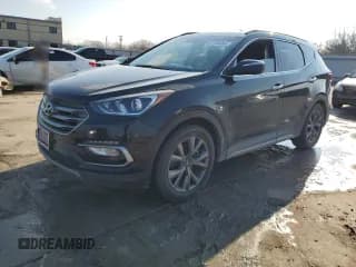 ✅ 2018 Hyundai Santa Fe Ultimate • VIN: 5XYZW4LA3JG516365 • Лот: 41126464. Опубликован ранее на Copart с пробегом Не указан. Бесплатный доступ к архиву аукционных продаж из США и подробный отчёт об истории автомобиля на DreamBid. Изображение 1.
