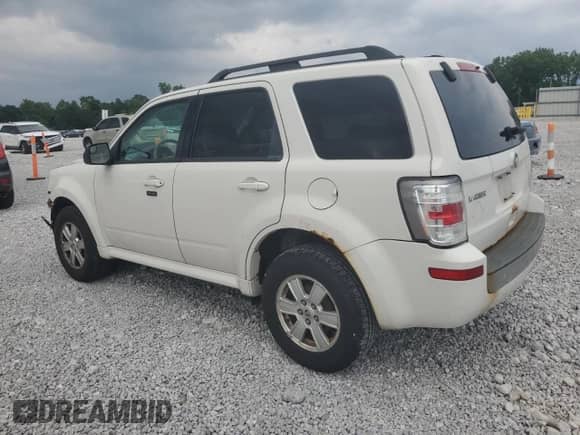 2011 Mercury Mariner z VIN 4M2CN8B71BKJ01749, wystawiony jako Copart lot #64199345 z przebiegiem 157 001 mil mil oraz Szkoda całkowita • Salvage title. Historia ofert i sprzedaży dostępna na DreamBid. Obrazek 2.