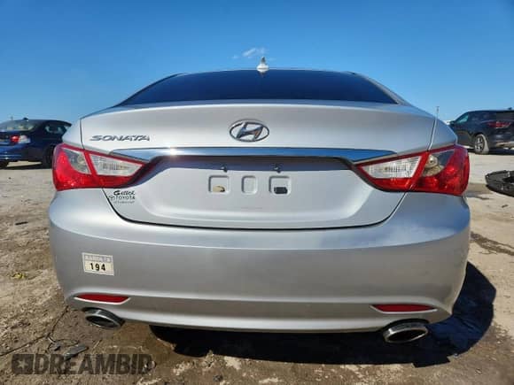 2011 Hyundai Sonata Limited z VIN 5NPEC4ACXBH014426, wystawiony jako Copart lot #87233345 z przebiegiem Nie podano mil oraz Szkoda całkowita • Salvage title. Historia ofert i sprzedaży dostępna na DreamBid. Obrazek 6.