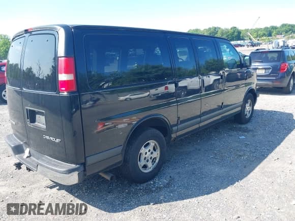 ✅ 2005 Chevrolet Express Passenger • VIN: 1GNFG15T751169844 • Lot: 42393893. Listed on IAAI with 226,673 mi. Free auction sales archive from the USA and detailed vehicle history report at DreamBid. Image 4.