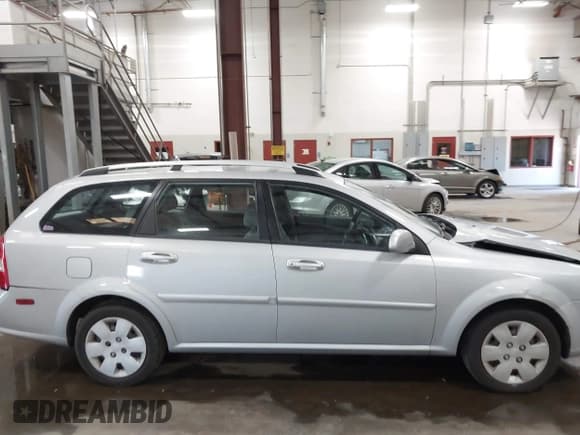 ✅ 2006 Suzuki Forenza • VIN: KL5JD86Z96K347066 • Lot: 43031924. Listed on IAAI with 65,393 mi. Free auction sales archive from the USA and detailed vehicle history report at DreamBid. Image 13.