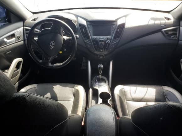 2015 Hyundai Veloster Turbo z VIN KMHTC6AE8FU241173, wystawiony jako Copart lot #40641794 z przebiegiem 96 293 mil mil oraz . Historia ofert i sprzedaży dostępna na DreamBid. Obrazek 8.