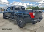 ✅ 2016 Nissan Titan Platinum Reserve • VIN: 1N6BA1F49GN513358 • Lot: 96068105. Listed on Copart with 84,665 mi. Free auction sales archive from the USA and detailed vehicle history report at DreamBid. Image 2.