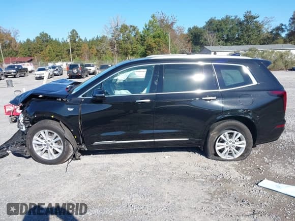 ✅ 2023 Cadillac XT6 FWD Luxury • VIN: 1GYKPAR46PZ120241 • Lot: 43678995. Listed on IAAI with 63,617 mi. Free auction sales archive from the USA and detailed vehicle history report at DreamBid. Image 14.