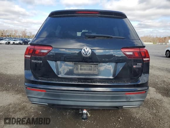 ✅ 2018 Volkswagen Tiguan S • VIN: 3VV0B7AX0JM072623 • Лот: 93726515. Опубликован ранее на Copart с пробегом 94 710 миль. Бесплатный доступ к архиву аукционных продаж из США и подробный отчёт об истории автомобиля на DreamBid. Изображение 6.