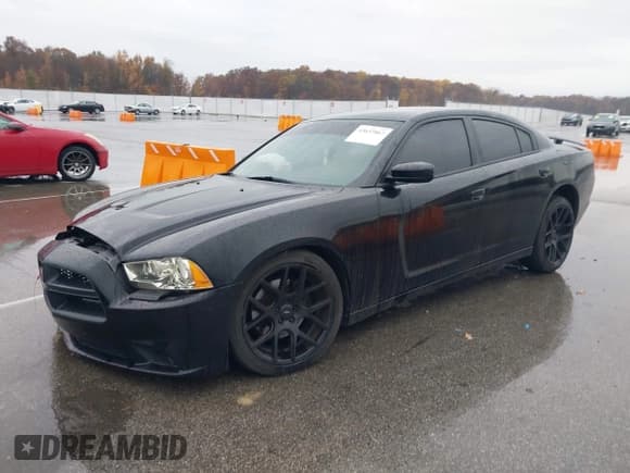 ✅ 2013 Dodge Charger Police • VIN: 2C3CDXAT3DH544355 • Lot: 43637867. Listed on IAAI with 231,452 mi. Free auction sales archive from the USA and detailed vehicle history report at DreamBid. Image 2.