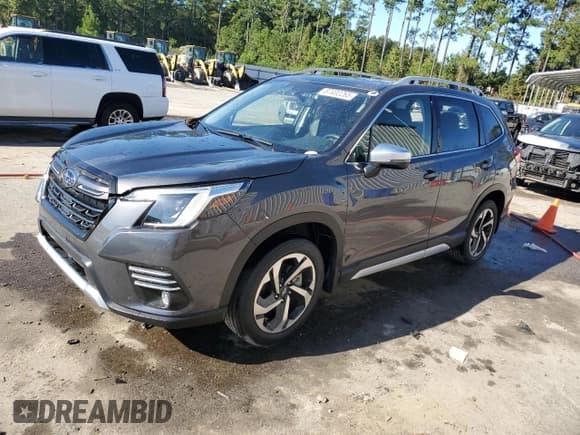 ✅ 2023 Subaru Forester Touring • VIN: JF2SKARC4PH439608 • Lot: 87402265. Listed on Copart with 29,851 mi. Free auction sales archive from the USA and detailed vehicle history report at DreamBid. Image 1.