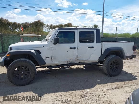 ✅ 2020 Jeep Gladiator Sport S • VIN: 1C6HJTAG3LL125405 • Lot: 43379807. Wystawiony na IAAI z przebiegiem 102 440 mil. Bezpłatny archiwum sprzedaży aukcyjnych z USA i szczegółowy raport historii pojazdu na DreamBid. Zdjęcie 14.