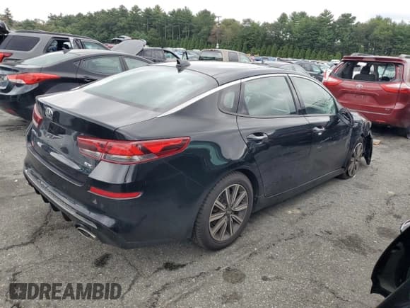 ✅ 2019 Kia Optima EX • VIN: 5XXGU4L11KG315938 • Лот: 81035045. Опубликован ранее на Copart с пробегом 86 522 миль. Бесплатный доступ к архиву аукционных продаж из США и подробный отчёт об истории автомобиля на DreamBid. Изображение 3.