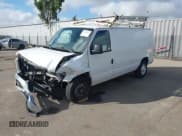 ✅ 2014 Ford Econoline Cargo Commercial • VIN: 1FTNE2ELXEDA21198 • Lot: 43516262. Listed on IAAI with 131,879 mi. Free auction sales archive from the USA and detailed vehicle history report at DreamBid. Image 2.
