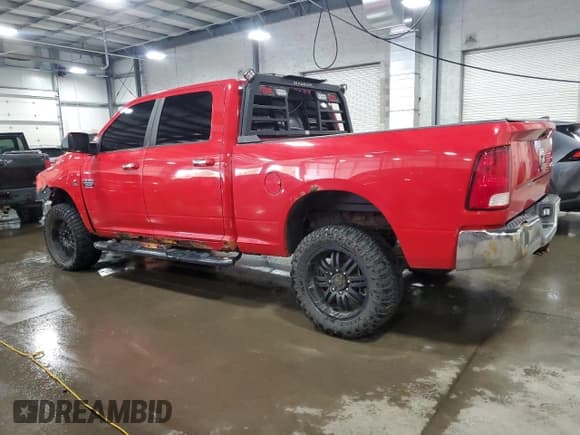 ✅ 2012 Ram 2500 SLT • VIN: 3C6UD5DL4CG305483 • Lot: 65750565. Listed on Copart with 181,996 mi. Free auction sales archive from the USA and detailed vehicle history report at DreamBid. Image 2.