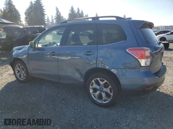 2018 Subaru Forester Touring with VIN JF2SJAWC4JH533194, listed as a Copart auction lot 85264165 with 115,027 mi miles and Salvage title. Bid and sale history available at DreamBid. Image 2.