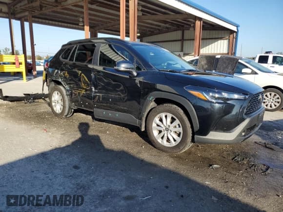 ✅ 2024 Toyota Corolla Cross LE • VIN: 7MUBAAAG9RV088263 • Lot: 93032095. Listed on Copart with 23,549 mi. Free auction sales archive from the USA and detailed vehicle history report at DreamBid. Image 4.