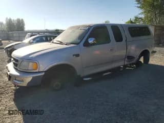 ✅ 1998 Ford F-150 XL • VIN: 2FTRX08L1WCA63269 • Lot: 65139005. Listed on Copart with 286,987 mi. Free auction sales archive from the USA and detailed vehicle history report at DreamBid. Image 1.