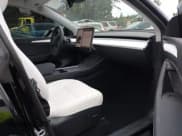 ✅ 2023 Tesla Model Y Long Range • VIN: 7SAYGDEE2PF885116 • Lot: 40091902. Listed on IAAI with 11,779 mi. Free auction sales archive from the USA and detailed vehicle history report at DreamBid. Image 5.