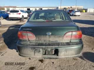 2003 Chevrolet Malibu with VIN 1G1ND52J03M704184, listed as a Copart auction lot 81572604 with 105,158 mi miles and Salvage title. Bid and sale history available at DreamBid. Image 6.