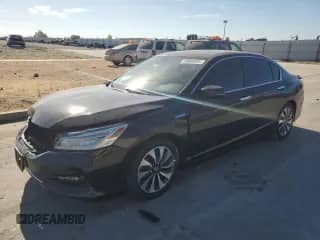 2017 Honda Accord Touring z VIN JHMCR6F71HC003038, wystawiony jako Copart lot #69660985 z przebiegiem 135 588 mil mil oraz Szkoda całkowita • Salvage title. Historia ofert i sprzedaży dostępna na DreamBid. Obrazek 1.