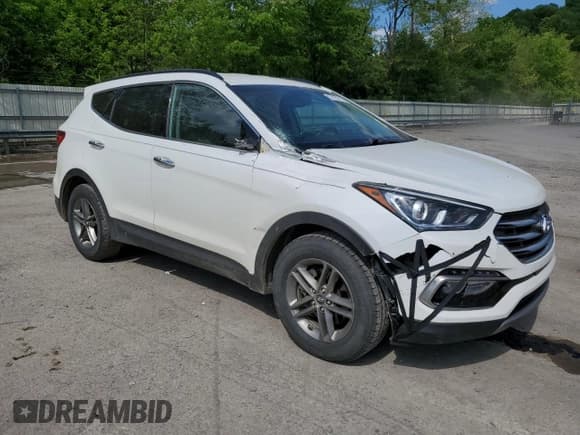 ✅ 2017 Hyundai Santa Fe 2.4L • VIN: 5XYZUDLB7HG388382 • Lot: 57167315. Listed on Copart with 128,724 mi. Free auction sales archive from the USA and detailed vehicle history report at DreamBid. Image 4.