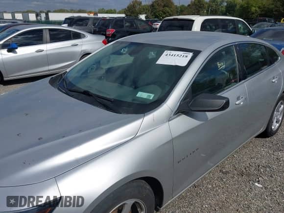 2016 Chevrolet Malibu LS z VIN 1G1ZB5ST1GF311152, wystawiony jako IAAI lot #43415218 z przebiegiem 142 771 mil mil oraz . Historia ofert i sprzedaży dostępna na DreamBid. Obrazek 6.