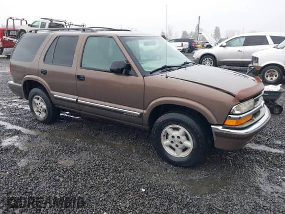 2000 Chevrolet Blazer LT with VIN 1GNDT13W1YK162399, listed as a IAAI auction lot 41461888 with 152,028 mi miles and . Bid and sale history available at DreamBid. Image 1.