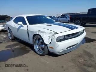 ✅ 2013 Dodge Challenger SXT • VIN: 2C3CDYAG3DH573945 • Lot: 41443472. Wystawiony na IAAI z przebiegiem 149 823 mil. Bezpłatny archiwum sprzedaży aukcyjnych z USA i szczegółowy raport historii pojazdu na DreamBid. Zdjęcie 1.