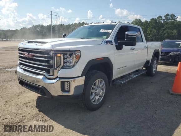 ✅ 2020 GMC Sierra 2500HD SLT • VIN: 1GT49NE74LF156506 • Lot: 67862625. Listed on Copart with 98,596 mi. Free auction sales archive from the USA and detailed vehicle history report at DreamBid. Image 1.