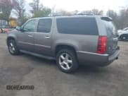 ✅ 2011 Chevrolet Suburban LTZ • VIN: 1GNSKKE39BR170395 • Lot: 43604666. Listed on IAAI with 186,630 mi. Free auction sales archive from the USA and detailed vehicle history report at DreamBid. Image 3.