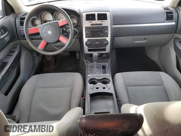 2010 Dodge Charger z VIN 2B3CA4CD5AH113263, wystawiony jako Copart lot #43317674 z przebiegiem 182 072 mil mil oraz Nie do naprawy • Non repairable. Historia ofert i sprzedaży dostępna na DreamBid. Obrazek 8.