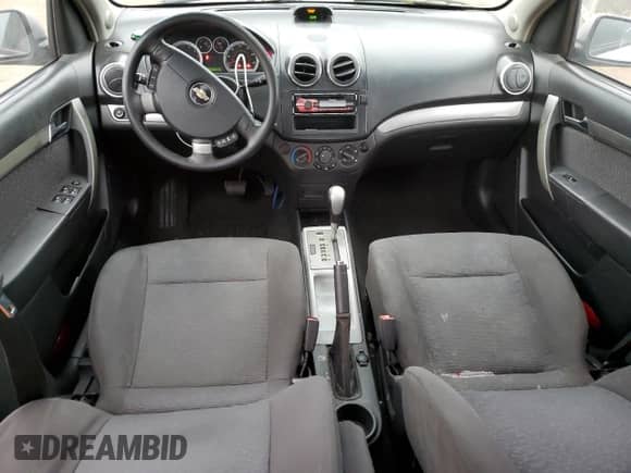 2007 Chevrolet Aveo LT z VIN KL1TG56627B184316, wystawiony jako Copart lot #81376014 z przebiegiem 211 924 mil mil oraz Szkoda całkowita • Salvage title. Historia ofert i sprzedaży dostępna na DreamBid. Obrazek 8.