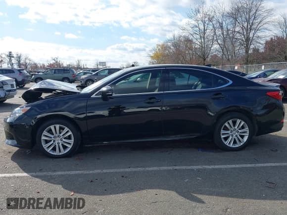 ✅ 2015 Lexus ES 330 • VIN: JTHBK1GG8F2210563 • Lot: 43671838. Listed on IAAI with 110,860 mi. Free auction sales archive from the USA and detailed vehicle history report at DreamBid. Image 14.