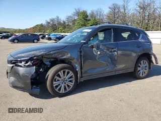✅ 2023 Mazda CX-5 Signature • VIN: JM3KFBXY0P0244795 • Lot: 65770745. Wystawiony na Copart z przebiegiem 28 247 mil. Bezpłatny archiwum sprzedaży aukcyjnych z USA i szczegółowy raport historii pojazdu na DreamBid. Zdjęcie 1.