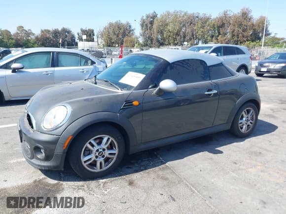 ✅ 2012 MINI Coupe • VIN: WMWSX1C51CT163757 • Лот: 42315909. Опубликован ранее на IAAI с пробегом 167 578 миль. Бесплатный доступ к архиву аукционных продаж из США и подробный отчёт об истории автомобиля на DreamBid. Изображение 2.