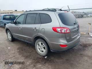 2011 Hyundai Santa Fe GLS z VIN 5XYZG3AB2BG078474, wystawiony jako IAAI lot #43241514 z przebiegiem 133 505 mil mil oraz . Historia ofert i sprzedaży dostępna na DreamBid. Obrazek 3.
