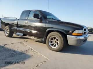 2000 Dodge Dakota Sport z VIN 1B7GL22N2YS764121, wystawiony jako Copart lot #75391714 z przebiegiem 232 126 mil mil oraz Szkoda całkowita • Salvage title. Historia ofert i sprzedaży dostępna na DreamBid. Obrazek 4.