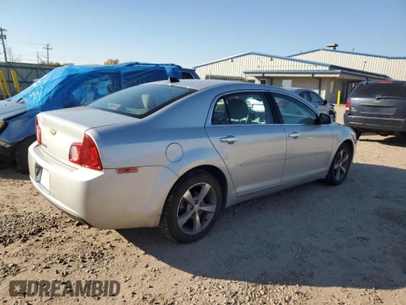 ✅ 2012 Chevrolet Malibu 1LT • VIN: 1G1ZC5E01CF157678 • Lot: 72015024. Listed on Copart with 96,843 mi. Free auction sales archive from the USA and detailed vehicle history report at DreamBid. Image 3.