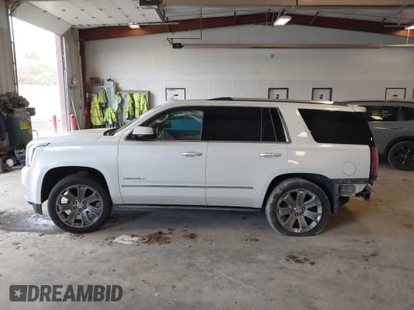 ✅ 2016 GMC Yukon Denali • VIN: 1GKS2CKJ3GR282705 • Lot: 43580312. Listed on IAAI with 145,963 mi. Free auction sales archive from the USA and detailed vehicle history report at DreamBid. Image 14.