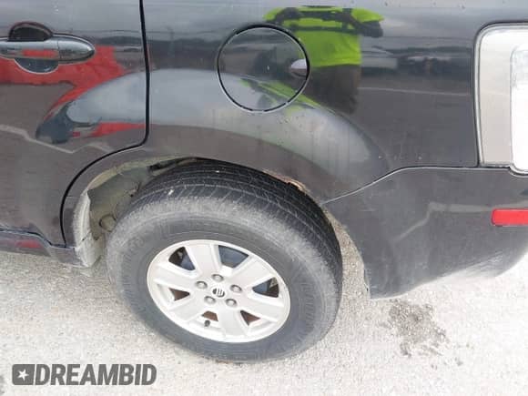 2010 Mercury Mariner z VIN 4M2CN8B71AKJ18792, wystawiony jako IAAI lot #42777106 z przebiegiem 193 930 mil mil oraz . Historia ofert i sprzedaży dostępna na DreamBid. Obrazek 6.