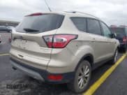 ✅ 2017 Ford Escape Titanium • VIN: 1FMCU0JD0HUE15077 • Lot: 43797538. Wystawiony na IAAI z przebiegiem 90 631 mil. Bezpłatny archiwum sprzedaży aukcyjnych z USA i szczegółowy raport historii pojazdu na DreamBid. Zdjęcie 4.