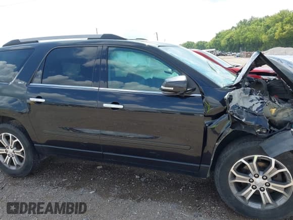 ✅ 2014 GMC Acadia SLT • VIN: 1GKKRSKD6EJ163722 • Lot: 42717218. Listed on IAAI with 135,655 mi. Free auction sales archive from the USA and detailed vehicle history report at DreamBid. Image 13.