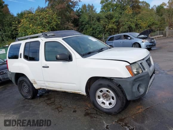 ✅ 2013 Nissan Xterra S • VIN: 5N1AN0NUXDN818096 • Lot: 43339051. Listed on IAAI with 293,220 mi. Free auction sales archive from the USA and detailed vehicle history report at DreamBid. Image 13.