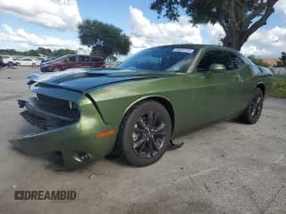 ✅ 2023 Dodge Challenger SXT • VIN: 2C3CDZGG9PH670617 • Лот: 86657725. Опубликован ранее на Copart с пробегом 29 717 миль. Бесплатный доступ к архиву аукционных продаж из США и подробный отчёт об истории автомобиля на DreamBid. Изображение 1.