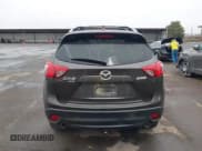 ✅ 2016 Mazda CX-5 Grand Touring • VIN: JM3KE4DY2G0763608 • Lot: 43864275. Wystawiony na IAAI z przebiegiem 95 452 mil. Bezpłatny archiwum sprzedaży aukcyjnych z USA i szczegółowy raport historii pojazdu na DreamBid. Zdjęcie 17.